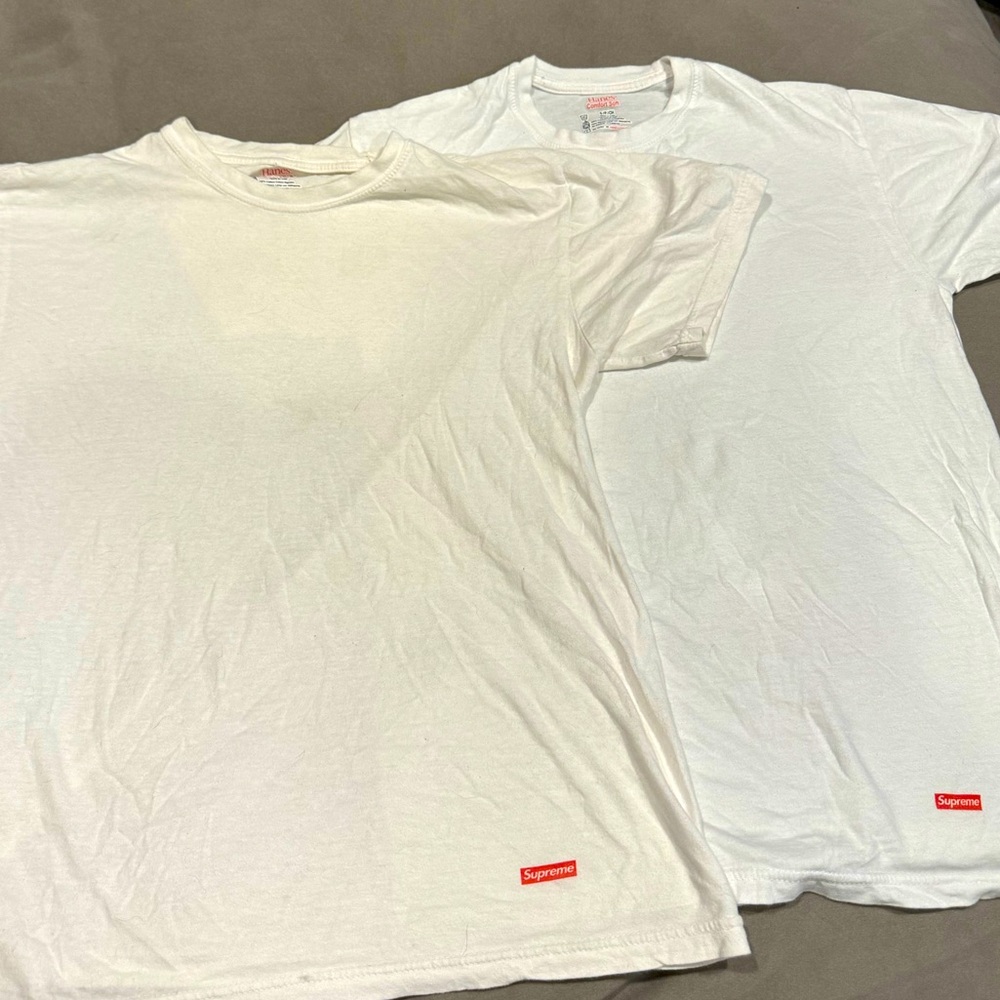 2 Supreme Hanes small men’s tees, as is. 1 brighter white. No stains, no rips.